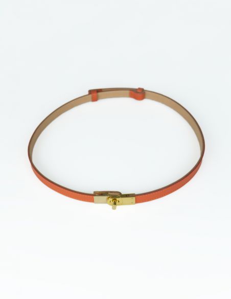 Pomarańczowy skórzany pasek...