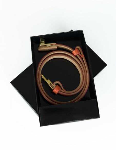 Pomarańczowy skórzany pasek...