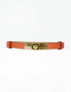 Pomarańczowy skórzany pasek...