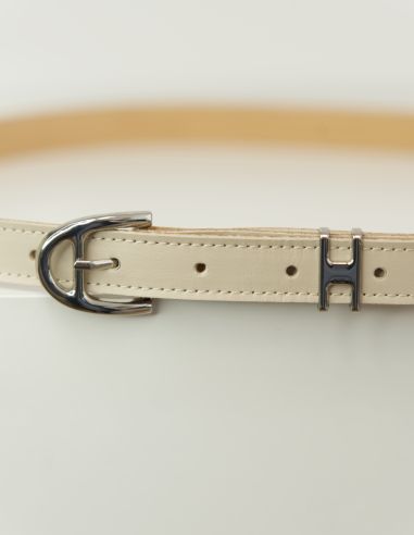 Jasnobeżowy skórzany pasek damski...