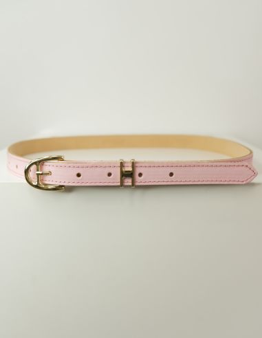 Jasnoróżowy skórzany pasek damski...