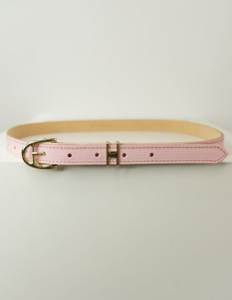 Jasnoróżowy skórzany pasek...